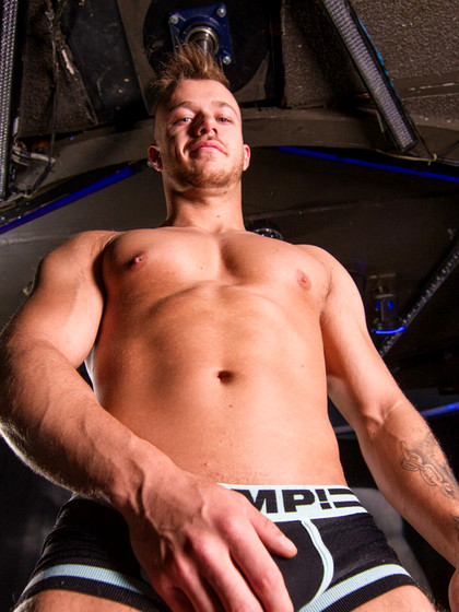 Young handsome Bryan sheds his clothes and reveals a big hard dick